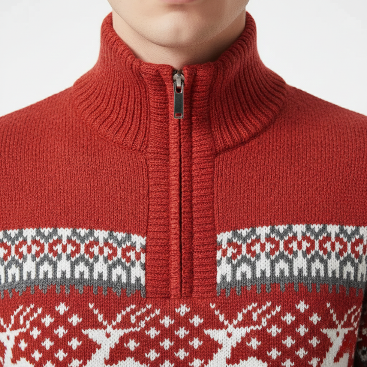 Red knit sweater with a patterned design on a white background