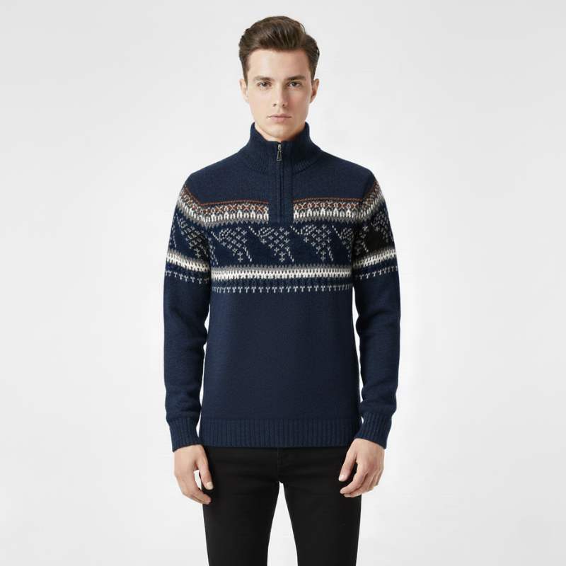 Man wearing a navy blue sweater with a patterned chest area on a white background