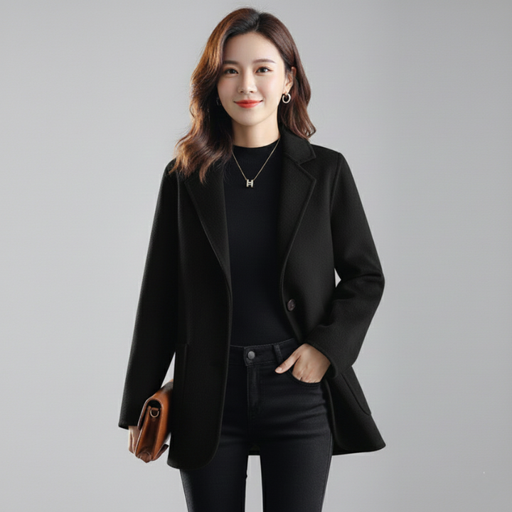 Women wearing black formal blazer front view
