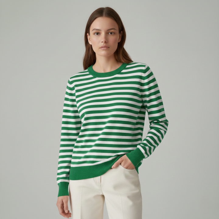 model posing in green and white striped sweater styled with light casual outfit