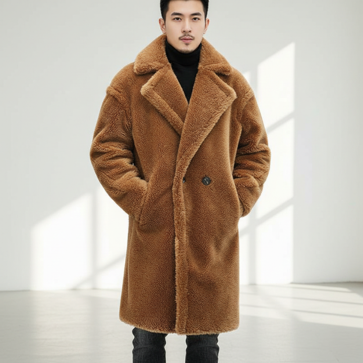 Full-body image of a man wearing a long brown sherpa overcoat with a relaxed winter silhouette.