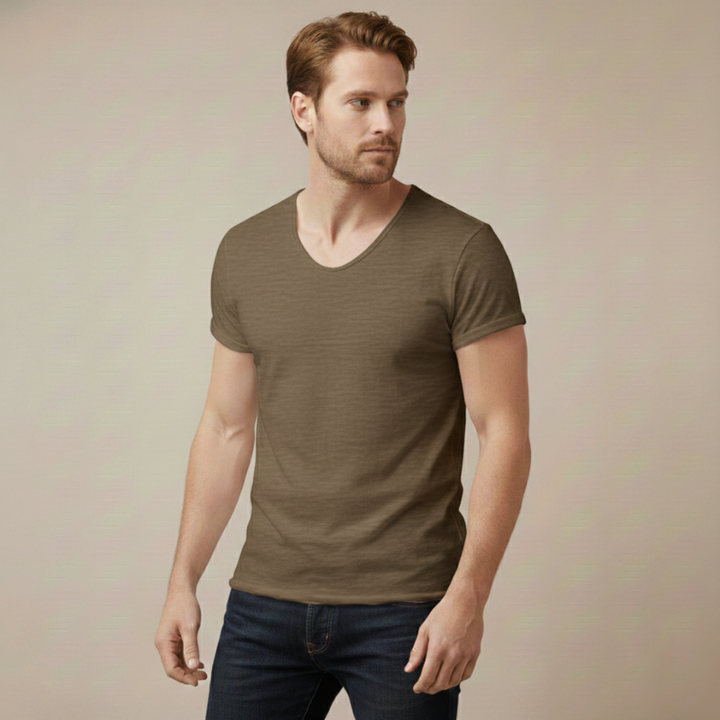 Man wearing a brown V-neck T-shirt with a relaxed fit and smooth cotton fabric in clean studio lighting.