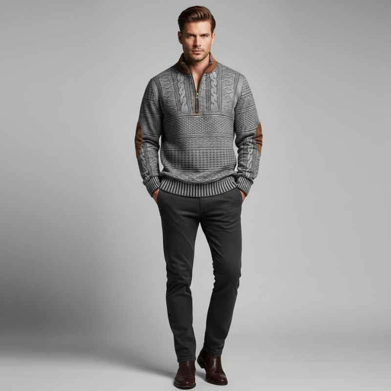Male model wearing a gray patterned half-zip knit sweater in a clean studio setting.