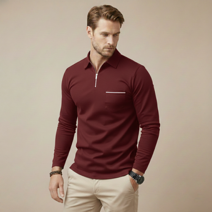 Male model wearing a maroon long-sleeve quarter-zip top with a slim tailored silhouette.