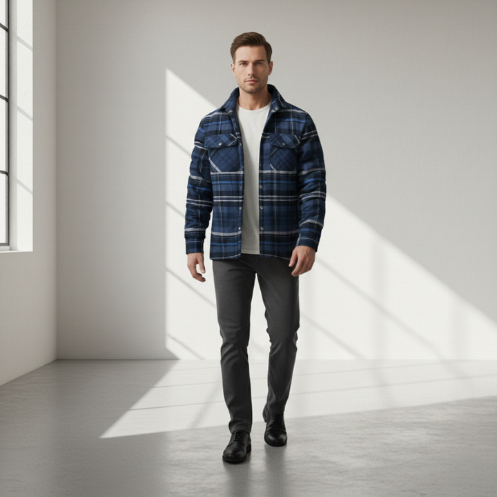 Male model wearing blue check jacket indoors